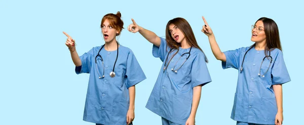 Group Nurses Pointing Away — Stock Photo, Image