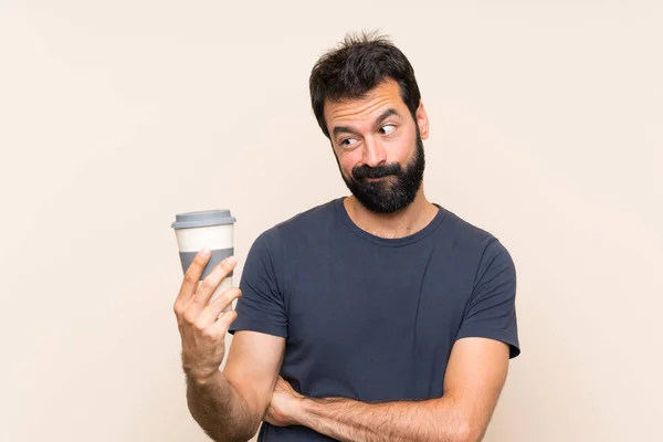 Man Med Skägg Håller Kaffe Med Sorgligt Uttryck — Stockfoto