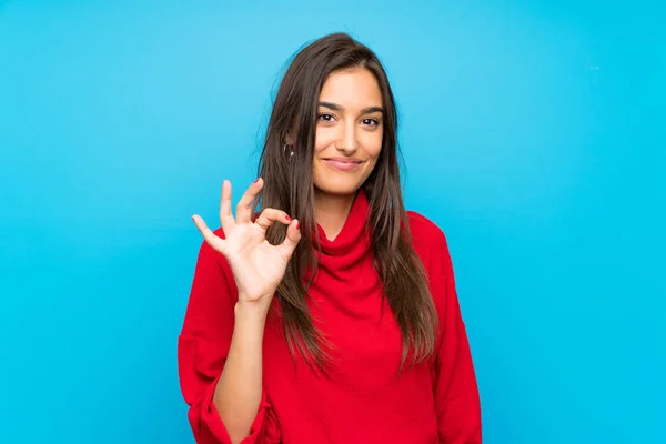 Giovane Donna Con Maglione Rosso Sfondo Blu Isolato Mostrando Segno — Foto Stock