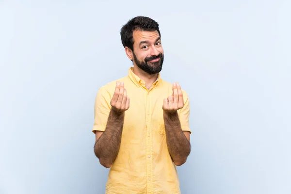 Junger Mann Mit Bart Über Isoliertem Blauem Hintergrund Macht Geld — Stockfoto