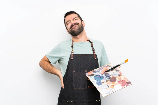 Jovem Artista Homem Segurando Uma Paleta Sobre Fundo Isolado Sofrendo — Fotografia de Stock