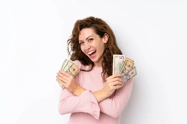 Joven Bonita Mujer Sobre Aislado Fondo Tomando Montón Dinero — Foto de Stock