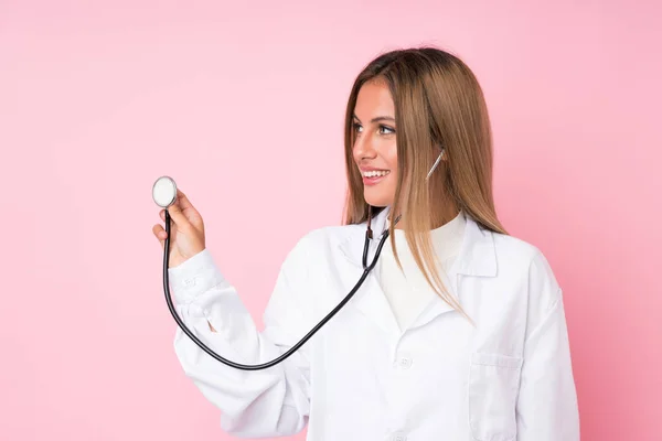 Young Blonde Woman Isolated Pink Background Doctor Gown — Stock Photo, Image