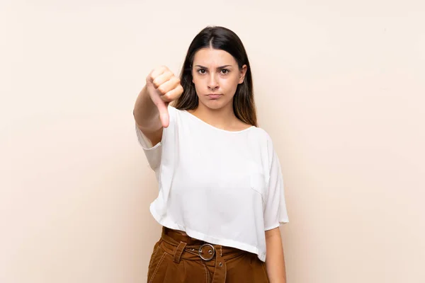 Jong Brunette Vrouw Geïsoleerde Achtergrond Tonen Duim Neer Met Negatieve — Stockfoto