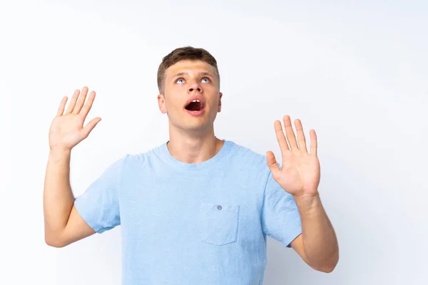 Junger Gutaussehender Mann Über Isoliertem Weißen Hintergrund Nervös Und Verängstigt — Stockfoto