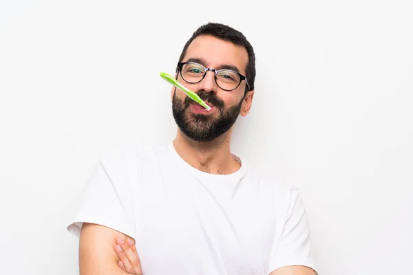 Чоловік Бородою Чистить Зуби Над Ізольованим Білим Тлом — стокове фото
