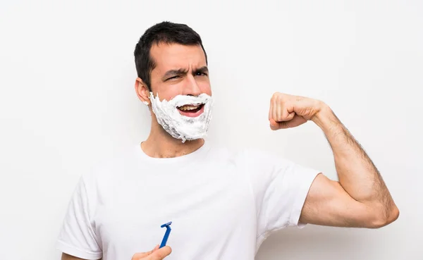 Man Shaving His Beard Isolated White Background Doing Strong Gesture — Stock Photo, Image