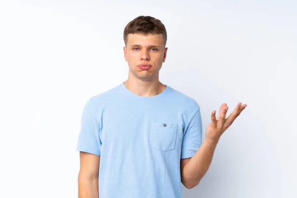 Joven Hombre Guapo Sobre Fondo Blanco Aislado Haciendo Gesto Dudas — Foto de Stock