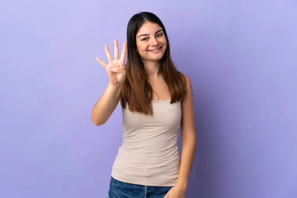 Mor Arka Planda Izole Edilmiş Genç Beyaz Kadın Mutlu Parmakları — Stok fotoğraf
