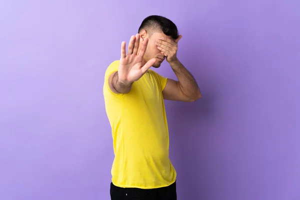 Young Colombian Man Isolated Purple Background Making Stop Gesture Covering — Stock Photo, Image