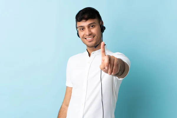 Telemarketer Colombian Man Working Headset Isolated Background Showing Lifting Finger — Stock Photo, Image