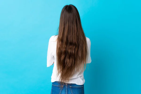 Mladá Běloška Žena Izolované Modrém Pozadí Zadní Poloze — Stock fotografie