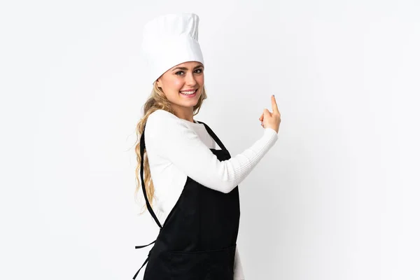 Giovane Donna Chef Brasiliano Isolato Sfondo Bianco Puntando Indietro — Foto Stock