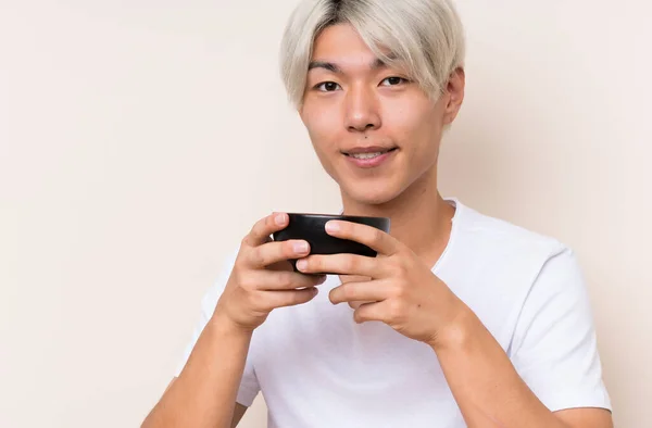 Joven Asiático Hombre Con Matcha Una Mesa —  Fotos de Stock