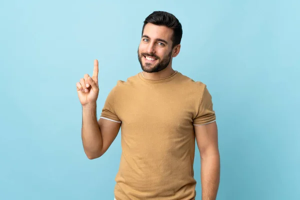 Joven Hombre Guapo Con Barba Sobre Fondo Aislado Mostrando Levantando — Foto de Stock