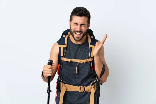 Junger Bergsteiger Mit Großem Rucksack Und Trekkingstöcken Auf Weißem Hintergrund — Stockfoto