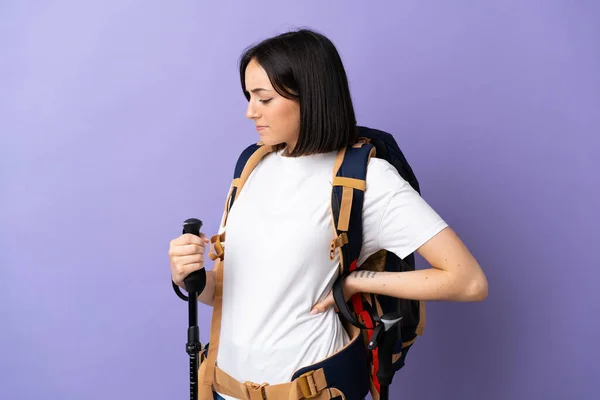 Young Caucasian Woman Backpack Trekking Poles Isolated Blue Background Suffering — Stock Photo, Image