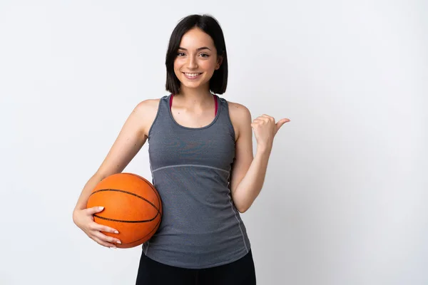 Young Woman Playing Basketball Isolated White Background Pointing Side Present — Stock Photo, Image