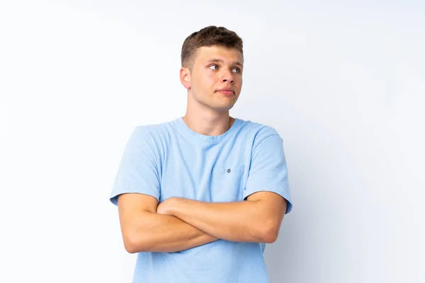 Joven Hombre Guapo Sobre Fondo Blanco Aislado Haciendo Gesto Dudas — Foto de Stock