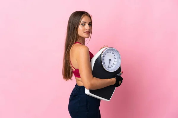 Young Uruguayan Woman Isolated Pink Background Weighing Machine — Stock Photo, Image