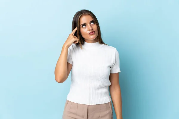 Jeune Femme Uruguayenne Isolée Sur Fond Bleu Faisant Geste Folie — Photo