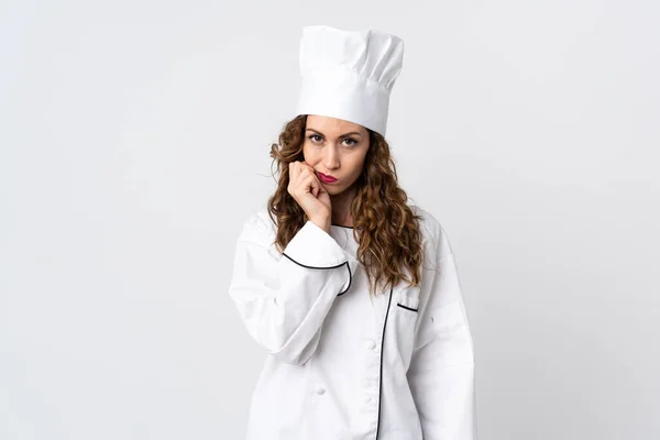 Beyaz Arka Planda Izole Edilmiş Genç Aşçı Kadın Şüpheleri Var — Stok fotoğraf