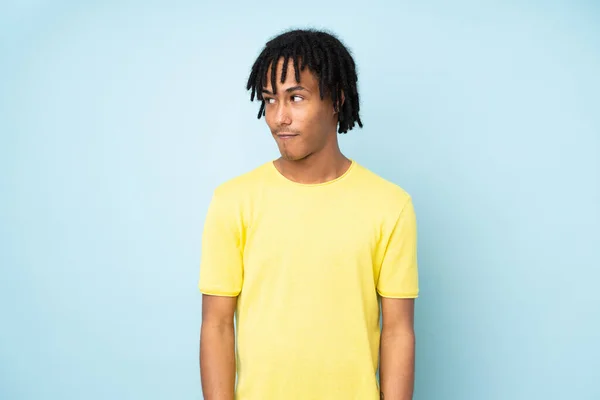 Young African American Man Isolated Blue Background Making Doubts Gesture — Stock Photo, Image