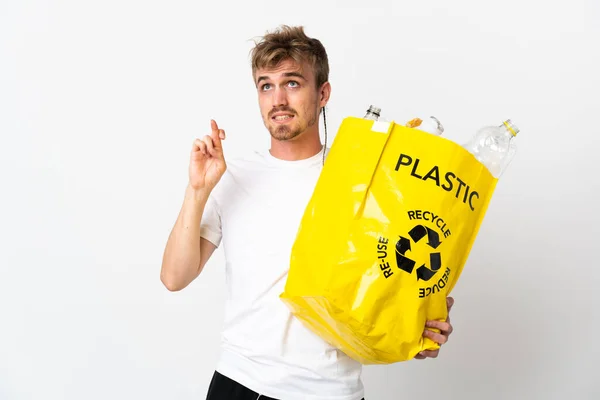 Mladý Blondýnka Muž Drží Recyklační Sáček Plný Papíru Recyklovat Izolované — Stock fotografie