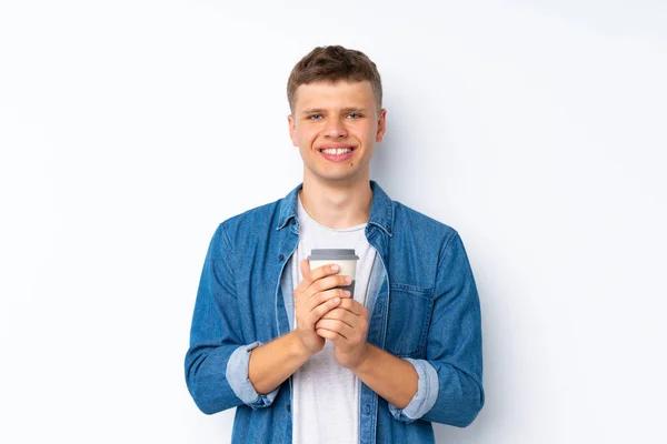 Joven Hombre Guapo Sobre Fondo Blanco Aislado Sosteniendo Café Para —  Fotos de Stock