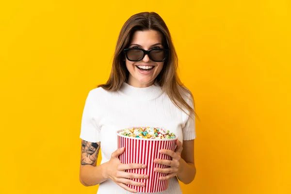 Young Slovak Woman Isolated Yellow Background Glasses Holding Big Bucket — Φωτογραφία Αρχείου