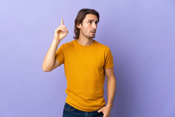 Young Handsome Man Isolated Purple Background Intending Realizes Solution While — Stock Photo, Image