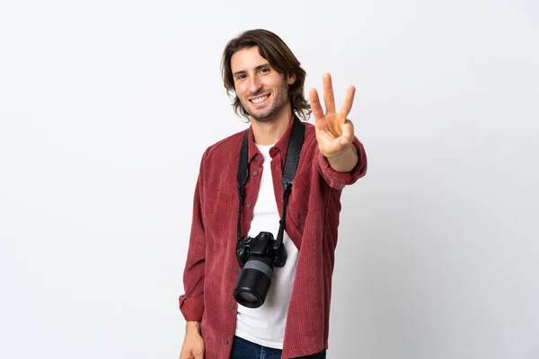 Joven Fotógrafo Aislado Sobre Fondo Blanco Feliz Contando Tres Con —  Fotos de Stock