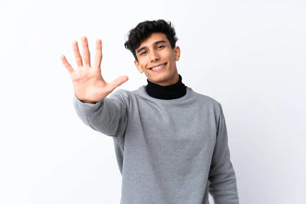 Junger Argentinier Vor Isoliertem Weißen Hintergrund Der Mit Den Fingern — Stockfoto