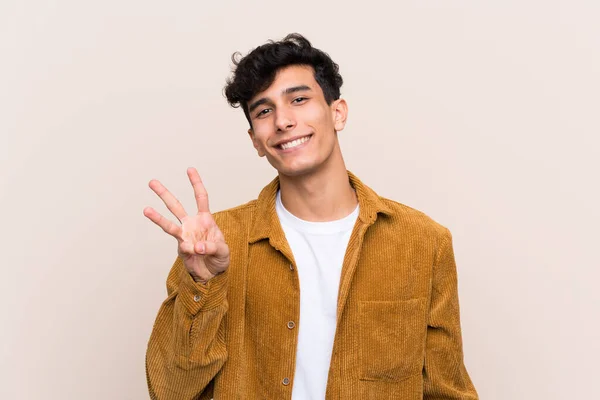 Mladý Argentinský Muž Přes Izolované Pozadí Šťastný Počítání Tři Prsty — Stock fotografie