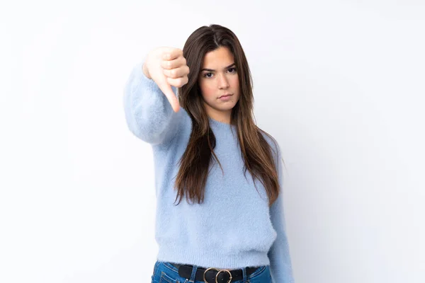 Adolescente Chica Sobre Aislado Blanco Fondo Mostrando Pulgar Hacia Abajo — Foto de Stock