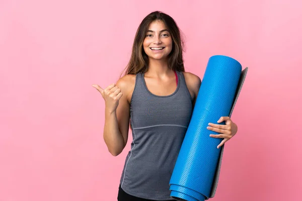 Young Sport Woman Going Yoga Classes While Holding Mat Isolated — Stock Photo, Image