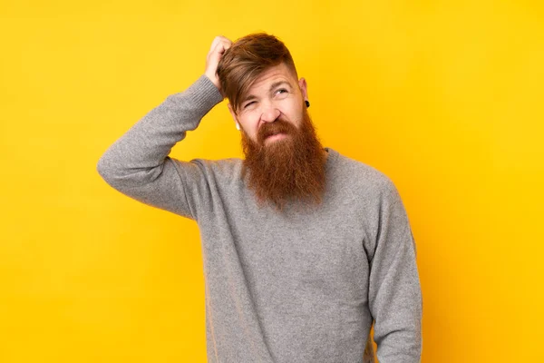 Redhead Man Long Beard Isolated Yellow Background Having Doubts While — Stock Photo, Image