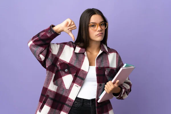 Jovem Estudante Mulher Isolado Fundo Roxo Mostrando Polegar Para Baixo — Fotografia de Stock