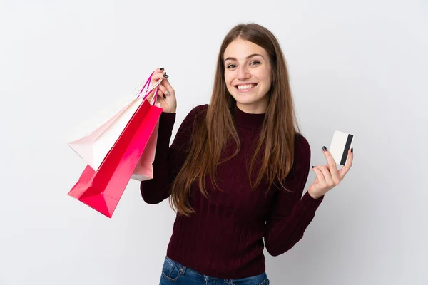 Mujer Joven Sobre Fondo Blanco Aislado Sosteniendo Bolsas Compras Una —  Fotos de Stock