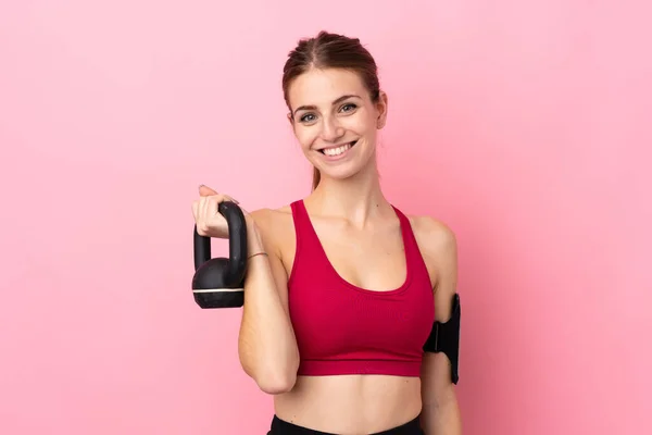 Young Sport Woman Isolated Pink Background Making Weightlifting Kettlebell — Stock Photo, Image