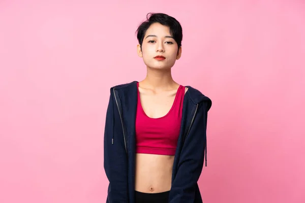 Giovane Sport Asiatico Donna Oltre Isolato Rosa Sfondo Stretching Braccio — Foto Stock