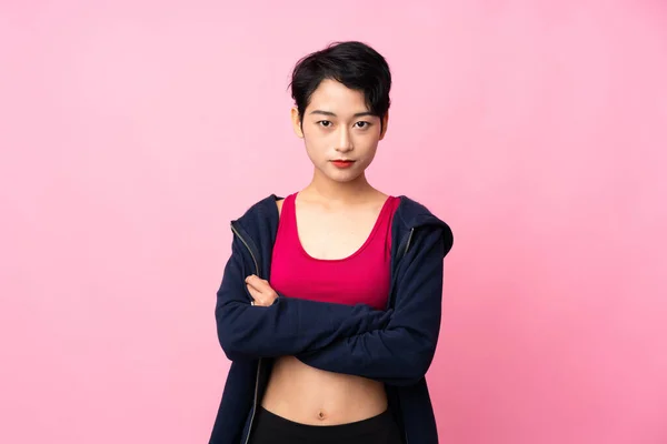 Joven Deporte Mujer Asiática Sobre Aislado Rosa Fondo Con Brazos — Foto de Stock