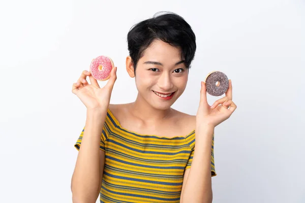 Menina Asiática Jovem Segurando Donuts — Fotografia de Stock