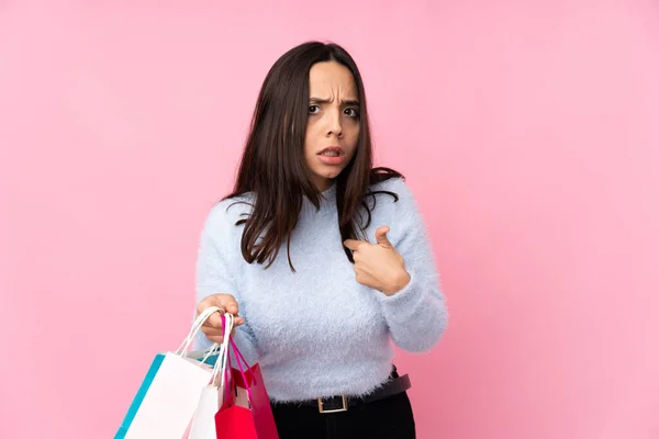 Young Woman Shopping Bag Isolated Pink Background Pointing Oneself — Stock Photo, Image