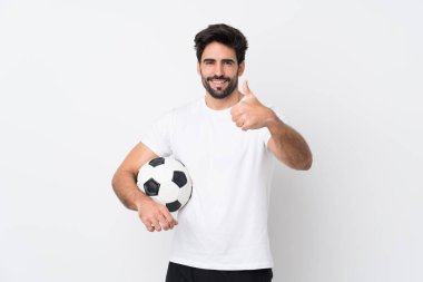 Sakallı, genç, yakışıklı, soyutlanmış beyaz bir geçmişi var. Başparmakları havada. Çünkü iyi bir şey oldu.