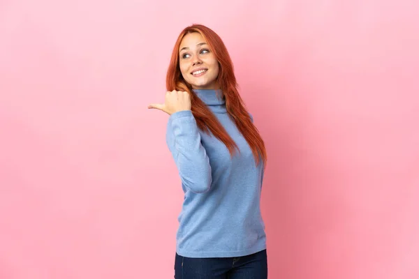 Teenager Russian Girl Isolated Pink Background Pointing Side Present Product — Stock Photo, Image