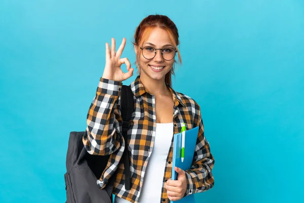 Adolescente Estudiante Ruso Chica Aislado Azul Fondo Mostrando Signo Con — Foto de Stock