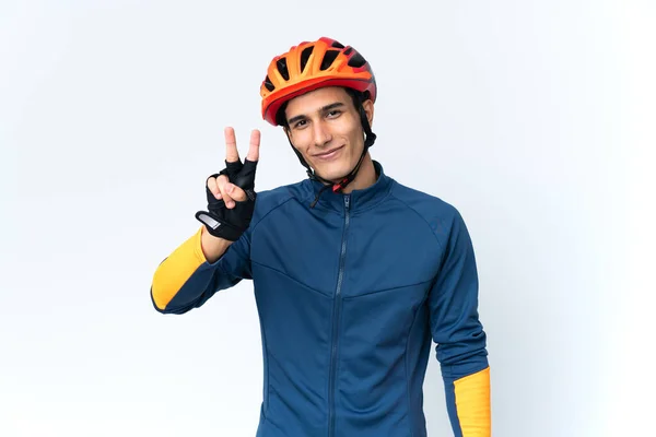 Joven Ciclista Aislado Fondo Sonriendo Mostrando Signo Victoria — Foto de Stock
