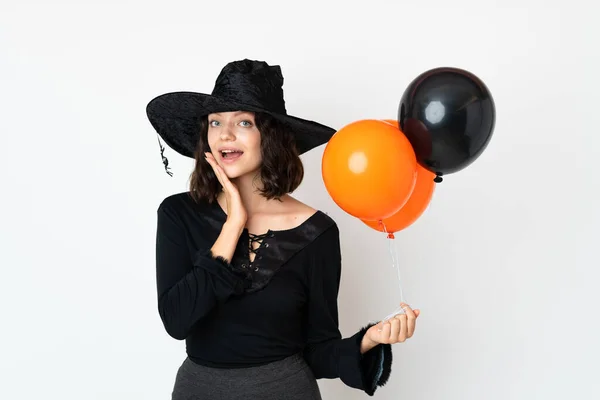 Joven Bruja Sosteniendo Globos Aire Negro Naranja Con Sorpresa Expresión — Foto de Stock