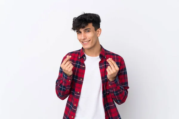 Jovem Argentino Homem Sobre Isolado Fundo Branco Fazendo Dinheiro Gesto — Fotografia de Stock